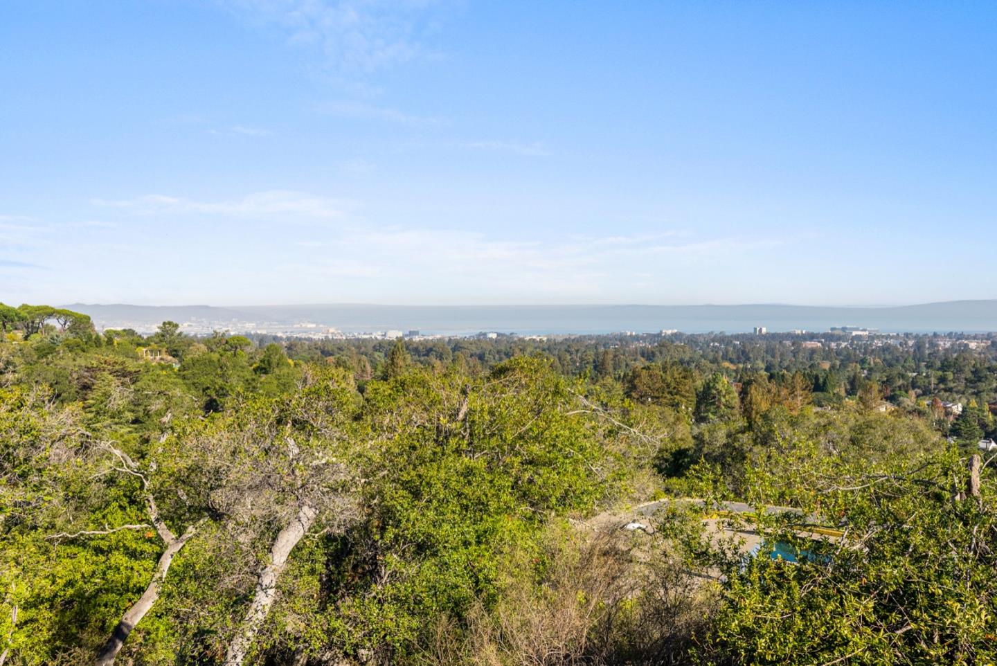 An UNOBSTRUCTED PANORAMIC VIEW like this is hard to find. Down a long private driveway on a nearly 2-acre lot is a 3 bedroom, 2.5 bathroom home remodeled in 2010.