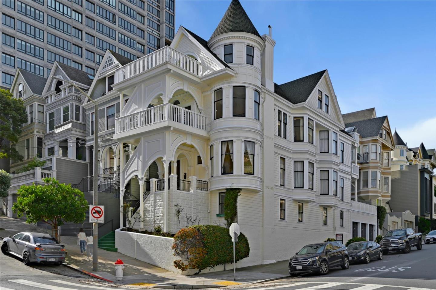 Own a piece of San Francisco history! First time on the market in 53 years, this stunning Victorian home has a turret, period details, and is situated on a premier Pacific Heights corner only 2 blocks from Union Street. Formal entry, 12 ft ceilings, stained glass windows, fireplace, ornate plasterwork, & intricate millwork. The adjacent living room & dining room act as a double parlor, with original pocket doors & many windows providing natural light. Upper floors have bay views & the expansive decks provide perfect outdoor living areas. Spacious patio above the 3-car garage is the perfect place for entertaining. Laundry & office with half bath & storage on ground floor. Originally a single-family home now has 3 permitted units (no Ellis Act.) New owners will have to decide how/if to modify for their purpose. All 3 units have separate addresses & entrances: 2665 Laguna (Front) 4 BR/3.5 BA ~2320 SF; 2005 Vallejo (Back) 3BR/~ 2.5 BA ~1850 SF; 2663  Laguna (Ground Floor) 1BR/1BA ~665 SF.