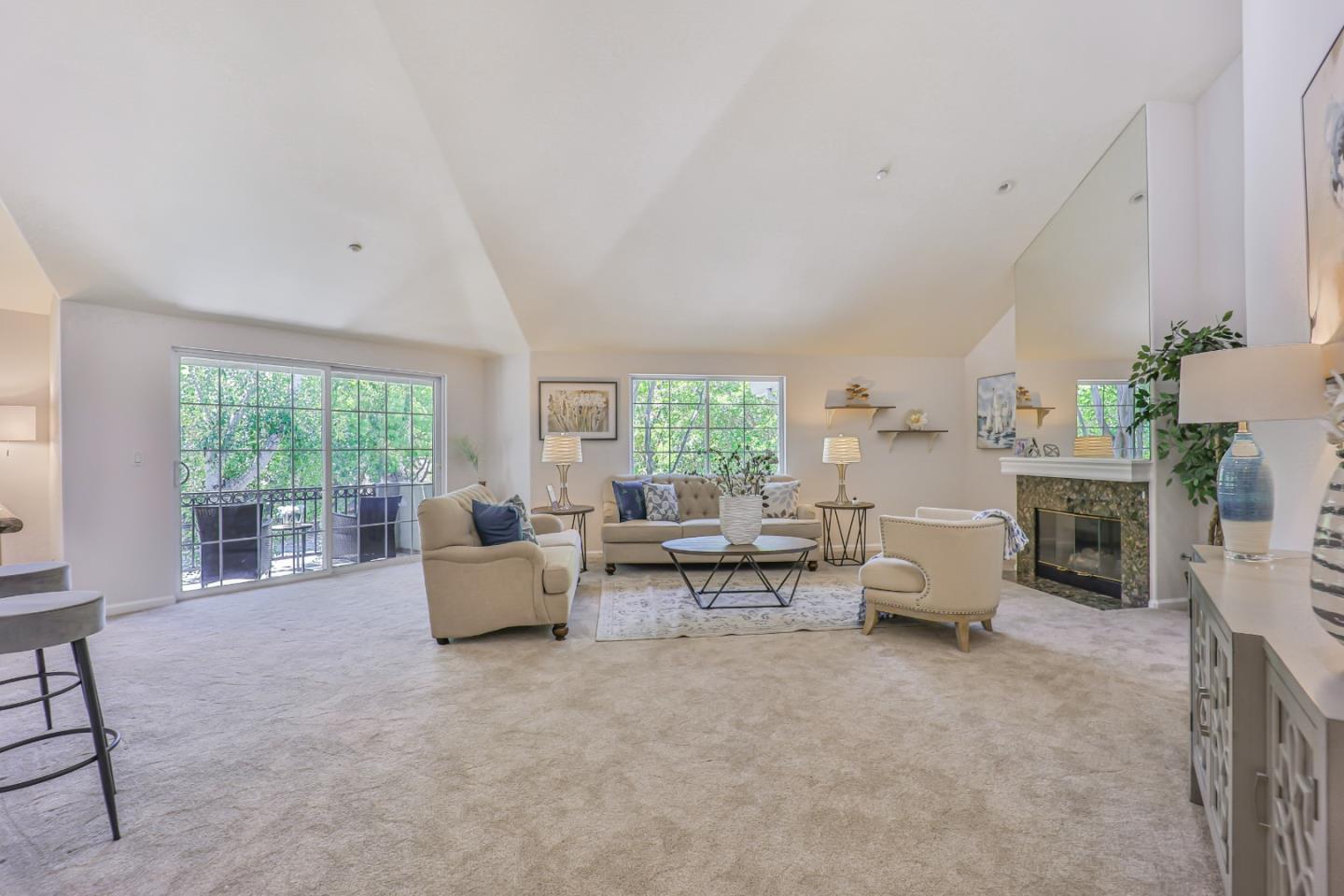 A luxurious condo in the sought-after Linfield Oaks neighborhood of Menlo Park. Enter a spacious living area with a vaulted ceiling, recessed lighting, a grand fireplace and sliding door entry to a sizable balcony overlooking lush green trees. Enjoy a bright & airy kitchen with granite countertops, breakfast bar seating, and beautiful wood cabinetry that carries over into the open dining area. The bedrooms are both well-proportioned with plenty of closet space to satisfy your needs. For added convenience, the Washer & Dryer are nicely located inside. The gated, secure building has a tastefully elegant entrance with a welcoming great room. The complex features, a beautiful swimming pool & spa, fitness center, library & game room, plus designated storage & bike storage area. Walk or bike to downtown Palo Alto and Menlo Park, Stanford University, commuter train stations, Burgess Park, top rated schools and so much more! Close to major freeways, shopping, restaurants & high-tech companies.