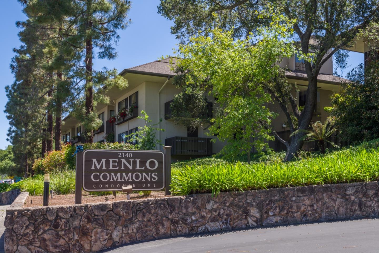 Rarely available corner unit on ground floor 2-bedroom 2-bath, located in the coveted community of Menlo Commons! This home is light, airy, and beautifully updated with hardwood floors, and a stylish kitchen complete with new granite countertops. The open floor plan invites you into the generously proportioned sunlit living space. This gated community for active adults 55 years+, offers beautifully manicured gardens, a community pool, spa, exercise facilities, an elegant clubhouse, & in-unit washer/dryers. A Fantastic location! Close to Stanford University, Stanford Shopping Center, Stanford Hospital, Sharon heights Shopping Center--easy access to I-280. HOA Dues includes water, garbage, cable and internet. Enjoy this peaceful retreat located in the highly desired Sharon Heights neighborhood.