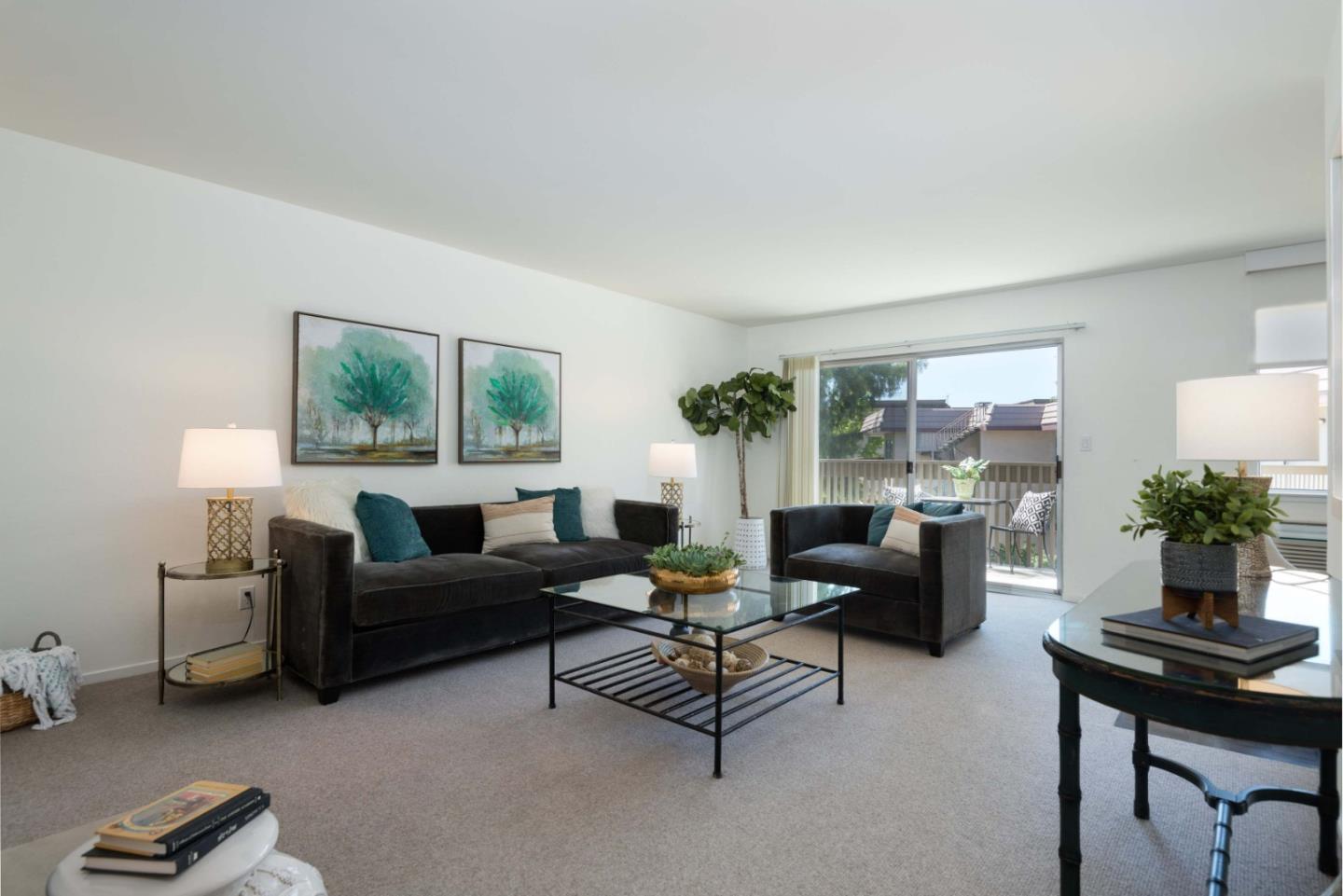 Located just two blocks from downtown Los Altos, this light & bright top-floor condominium has so much to offer, including a sunny deck overlooking the pool, wood-burning fireplace, & air conditioning. Wide windows and a large sliding glass door bring light into every room of this home. The kitchen has granite counters, ample cabinet space, and stainless appliances. The primary bedroom suite with a large walk-in closet and separate vanity.  This beautiful complex features a park-like setting, sparkling pool, and gated underground parking. An additional rented parking space is transferable to new the owner. Elevator access from the garage takes you securely to your floor. Laundry room is steps away with 2 washers and 2 dryers. Vibrant downtown with fabulous restaurants & retail just steps away. Easy access to commute routes, tech companies, & 5 miles to Stanford. Excellent Los Altos schools.