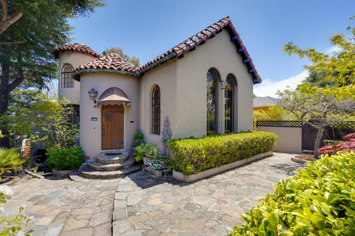 This Spanish-style home is very special, invoking fairy-tale like emotions with its stone pathways, charming fountains, & THAT VIEW! 377 Georgetown combines the sophistication and charm of the 1930s w/ the demands of the modern lifestyle. Blending seamlessly w/ the awe-inspiring 1933 construction, the magnificent kitchen-family room addition is truly the heart of this home, offering an abundance of space for the hustle & bustle of morning rush hour while remaining comfortable enough for afternoon homework & cozy enough for popcorn & movie night. The classic formal dining room & convenient butlers pantry set the stage for elegant entertaining, while the bonus rumpus room, on the lower level, allows for free play & laughter. Now, that view! 2 expansive decks provide multiple opportunities to take advantage of the amazing setting & soak in that view! Main level deck offers ample space for BBQing, outdoor dining, & entertaining, while upper-level deck screams romance & star-gazing.
