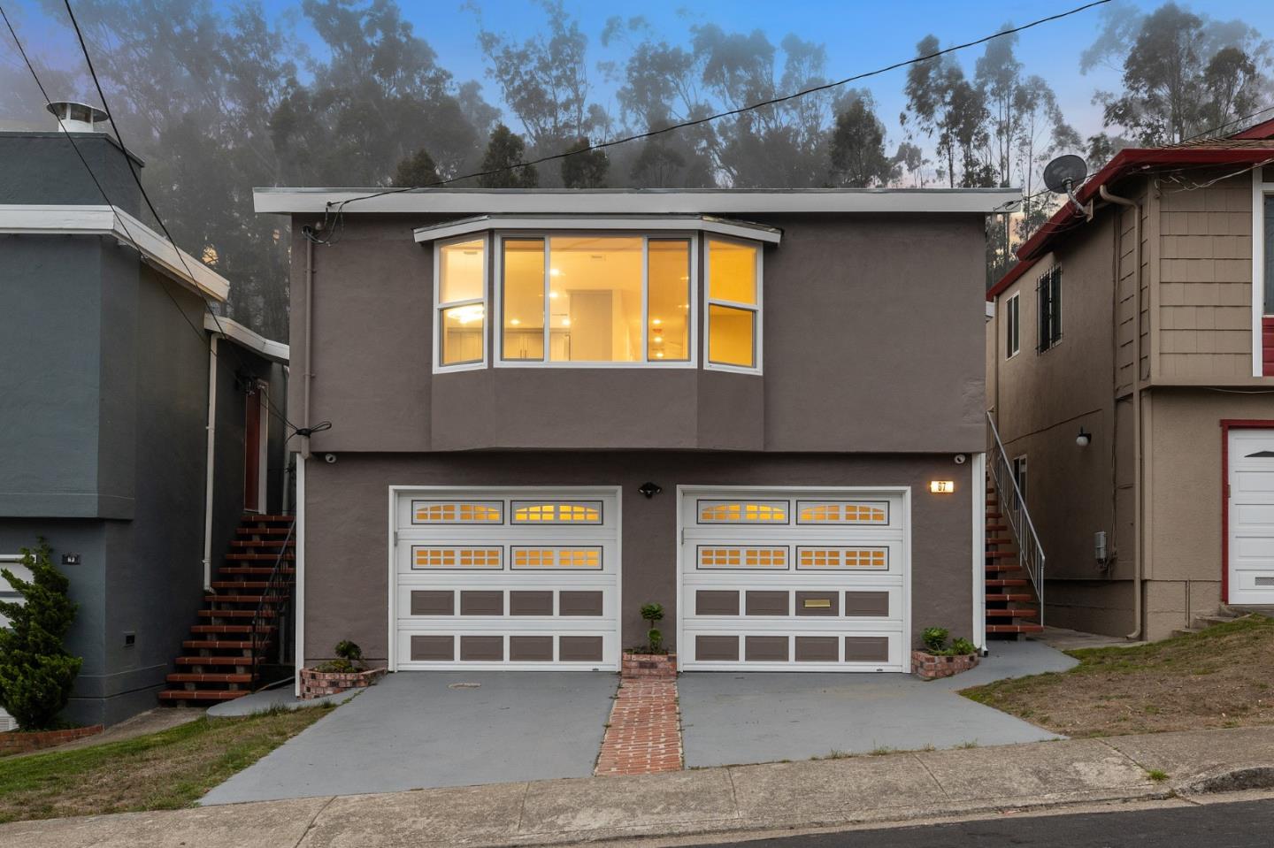 GORGEOUS NEWLY RENOVATED home in the Southern Hill neighborhood of Daly City! This 5 bedroom, 3 bathroom home offers beautifully modern improvements with an open floor plan. On the top floor, you will find a spacious living & dining area that transitions seamlessly into the kitchen, which features gorgeous gray cabinetry, quartz countertops, & stainless steel appliances, along with 3 sizable bedrooms & 2 updated full bathrooms. The lower level features an additional 2 bedrooms & bathroom, perfect for creating a dualistic living space between both the upper and lower levels. Enjoy your morning coffee surrounded by greenery or watch the sunset from the direct bedroom access to the upper level of the deck, while also being able to entertain family & friends on the spacious lower level of the deck. Conveniently located next to a variety of parks for those who enjoy the outdoors, the Cow Palace event center and major highways 101/280.