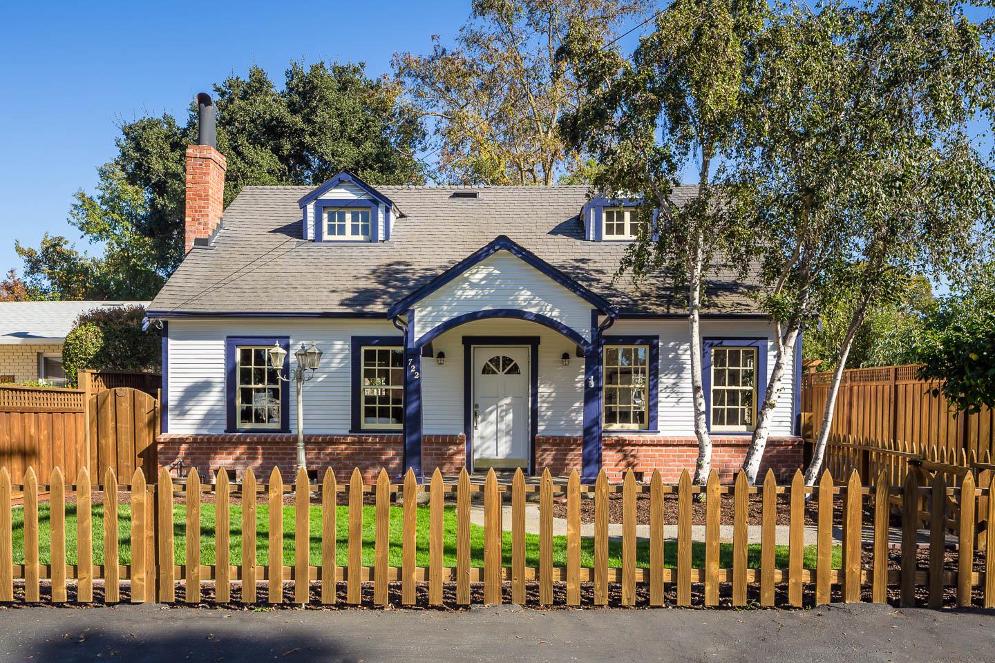 Nestled in the popular North Fair Oaks neighborhood, this quaint Cape Cod style residence is believed to be one of the original farmhouses that pre-date the area's development. With lath and plaster walls throughout, as well as many meticulously maintained original period details, the home is flooded with light and boasts generous room proportions. The living room is framed by a wood burning fireplace, stately woodwork, and built-in shelving, while the cheery country-style eat-in kitchen provides access to the backyard. The primary bedroom features a walk-in closet and proximity to the home's remodeled bathroom, while a second downstairs bedroom has flexible usage as a den or home office. Two additional bedrooms are upstairs with charming dormer windows. The backyard is spacious and sunny, while an oversized two-car detached garage offers space for a workshop. Primely positioned, the home is moments away from shopping and daily conveniences at Marsh Manor, as well as major employers.